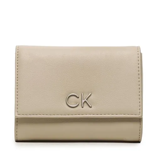 Большой женский кошелек Calvin Klein Re-Lock Trifold Md Pbl K60K610969 PEA