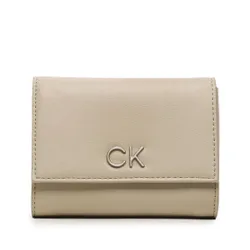 Большой женский кошелек Calvin Klein Re-Lock Trifold Md Pbl K60K610969 PEA