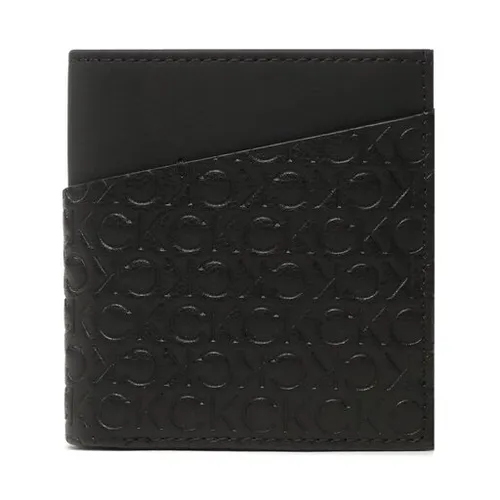 Большой женский кошелек Calvin Klein CK Must Mono Trifold 6cc с монетой K50K510306 01I