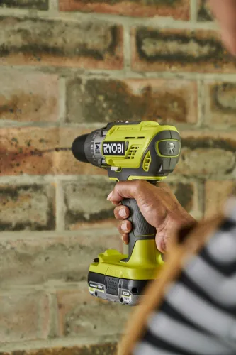 Wiertarko-wkrętarka RYOBI R18PD3-0 + Akumulator RYOBI RC18120-125 2.5Ah 18V + Ładowarka