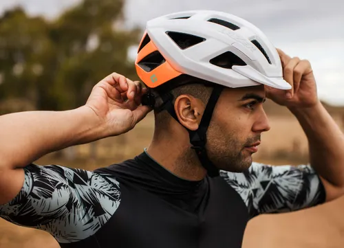 Kask rowerowy LAZER Cerro KinetiCore Biało-pomarańczowy MTB (rozmiar S)