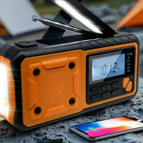 Radioodbiornik Beline AM/FM IPX3 z dynamem, latarką, powerbankiem i panelem solarnym Czarno-pomarańczowy