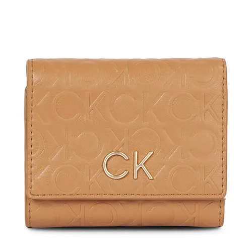 Женский кошелек Calvin Klein Re-Lock Trifold Xs Emb K60k611321 Brown Sugar GA5