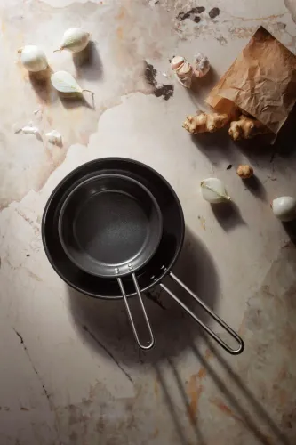 EVA TRIO - patelnia ze stali nierdzewnej z powłoką ceramiczną 24 cm