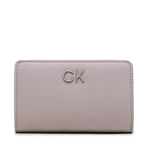 Большой женский кошелек Calvin Klein Re-Lock Bifold French Wallet Pbl K60K610962 VDQ