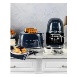 Toster Smeg TSF01NBEU Rozmrażanie 950W