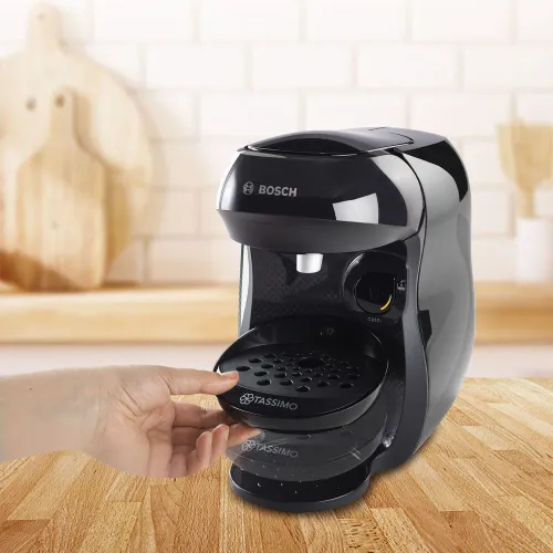 Zestaw ekspres kapsułkowy Bosch Tassimo Happy TAS1002N czarny i 5 opakowań kapsułek: Jacobs Latte Macchiato Classico, Cappucino Classico, Caffe Crema XL, L’OR Espresso Delizioso, Milka