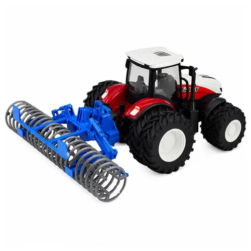Zdalnie sterowany traktor z wałem rolniczym światła