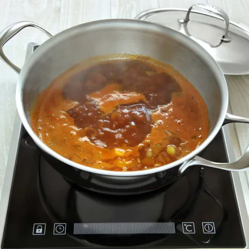 DEMEYERE Atlantis 28 cm - patelnia stalowa z pokrywką