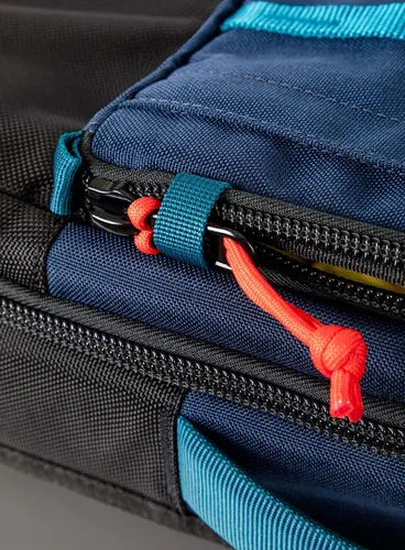 Torba / plecak na kółkach Topo Designs Global Travel Bag Roller - navy / sahara