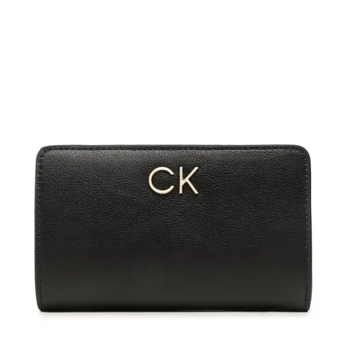 Большой женский кошелек Calvin Klein Re-Lock Bifold French Wallet Pbl K60K610962 BAX